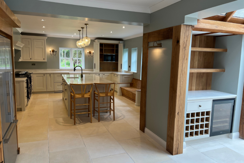 A modern kitchen featuring a stylish wine rack and a sleek bar area, perfect for entertaining guests.